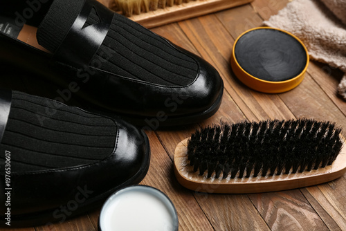 Brushes, shiny black shoes,...