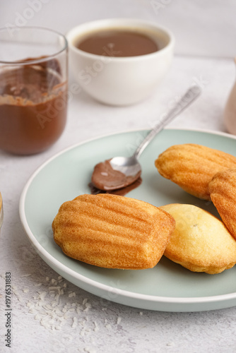 Plate with madeleines and s...