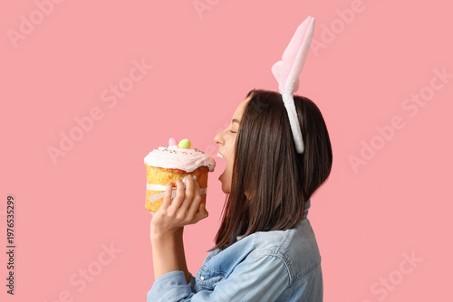 Pretty young woman with bun...
