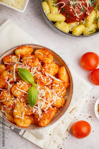 Bowls of tasty gnocchi with...