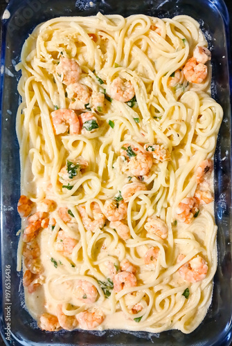 Macaroni made with fettuccine, a type of pasta popular in Roman and Tuscan cuisine, shrimp, and white sauce, in São Luís, MA, Brazil.