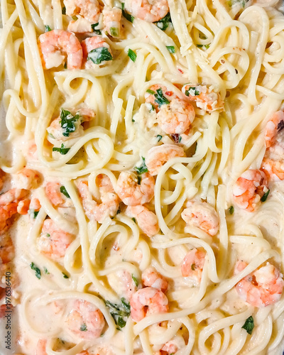 Macaroni made with fettuccine, a type of pasta popular in Roman and Tuscan cuisine, shrimp, and white sauce, in São Luís, MA, Brazil.