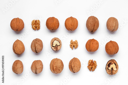 Natural walnuts on white ba...