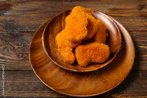 Plate with tasty nuggets on...