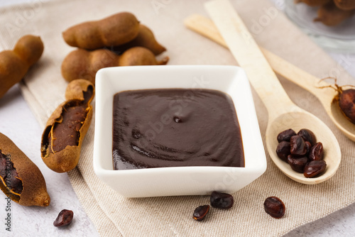 Bowl with tasty tamarind ja...