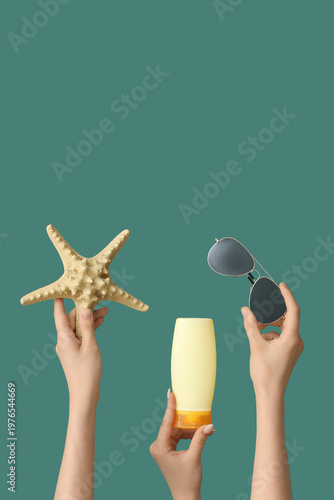 Female hands with bottle of...
