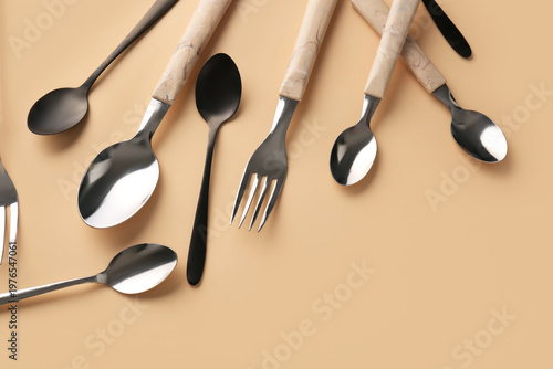 Silver and black cutlery on...