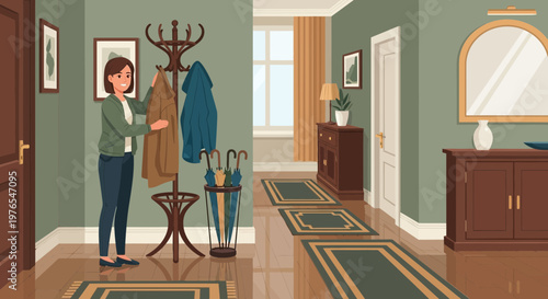 Woman choosing coat from hallway stand.