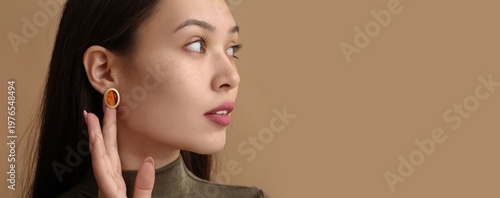 Young Asian woman wearing b...