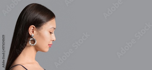 Young Asian woman wearing b...