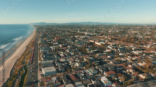 Drone aerial panorama of Carlsbad city with dense residential neighborhoods along scenic California coastline