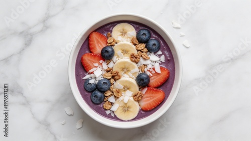 Healthy acai smoothie bowl flat lay with fresh berries fruit granola and coconut