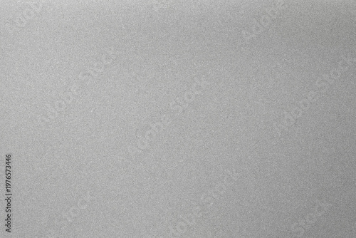 Φωτογραφία Fine silver grain spreads evenly across a light surface, offering a sleek, neutral backdrop ideal for technology branding, product mockups, or contemporary print design
