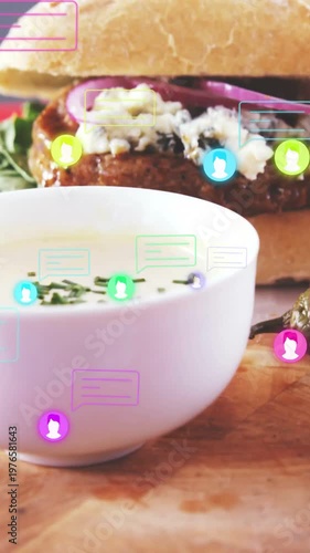 Vertical video: White soup bowl receiving incoming chat bubbles and avatar icons, promoting menu