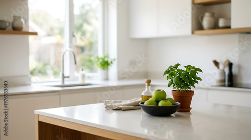 Modern Kitchen Interior with Green Apples and Fresh Basil Plant on Countertop