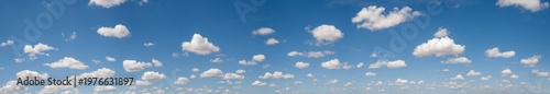 Wide Panorama Sky Replacement with Scattered White Cumulus Clouds horizon in a clear atmosphere