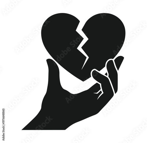 Black silhouette of a hand holding a broken heart on white background