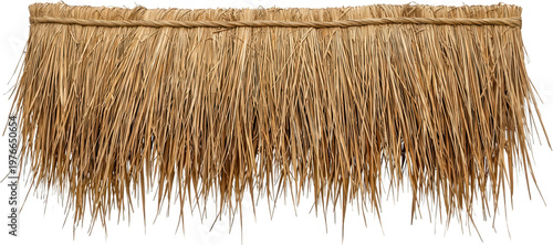 Detailed view of a thatched roof edge made of dried straw and twine providing a rustic and natural texture for architectural design material roofing construction building