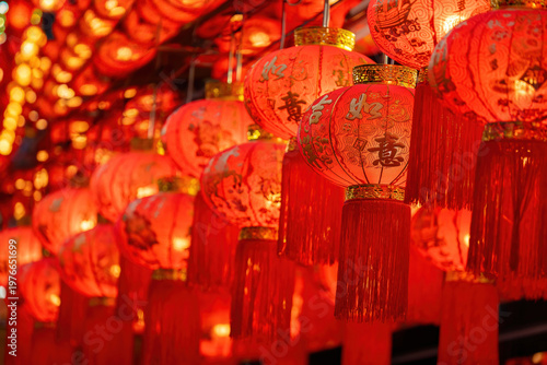 Photos Rows of red lanterns hung in rows during Chinese New Year, inscribed with auspicious greetings in Asian cities, create a beautiful and colorful spectacle befitting the festival