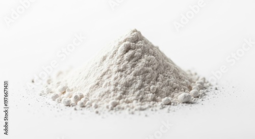 A small pile of fine white powder on a white background.