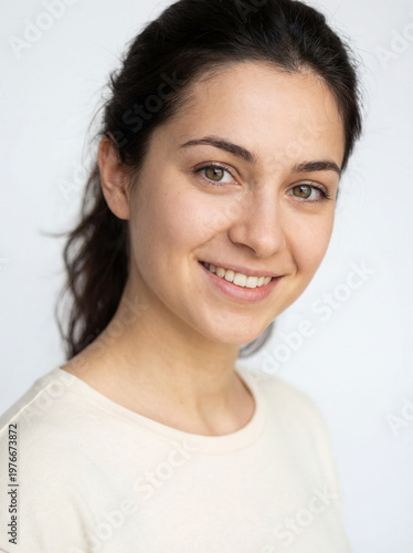 close-up portrait of a young woman with smooth skin and vibrant facial features