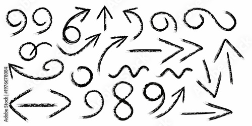 Collection of hand drawn arrows and scribbles on a white background