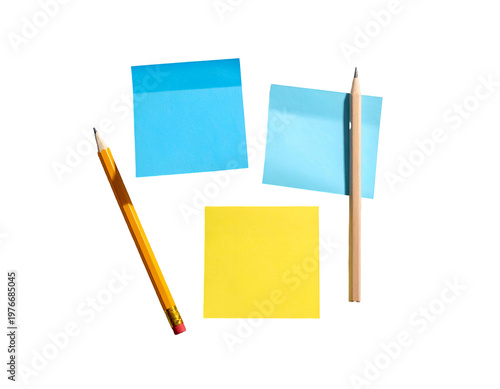 Three bright sticky notes and two pencils on white