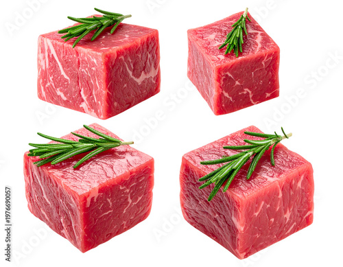 Four cubes of raw red meat, each topped with a sprig of rosemary