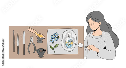 Artisan crafting delicate jewelry with flowers and resin, tools laid out