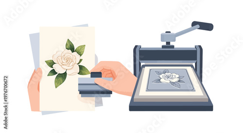 Artist printing floral artwork on paper using a printing press, close-up on hand and machine