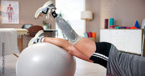 Obraz na plátne Exercise ball, training and prosthetic leg as person with disability at sport center in physical therapy
