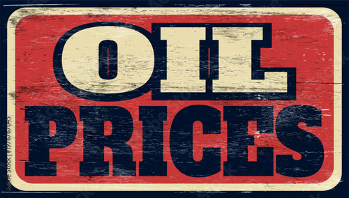 Aged and worn oil prices sign on wood