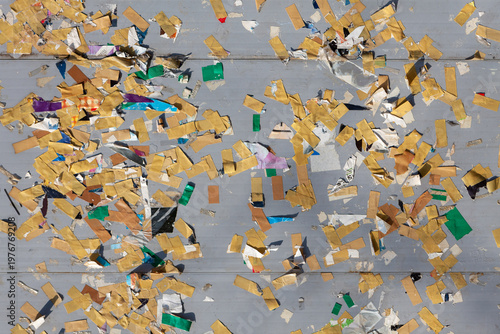 Wall with a grunge texture, marked by the lingering residue of adhesive tape