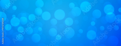 lovely circular bokeh blue wallpaper with defocused effect