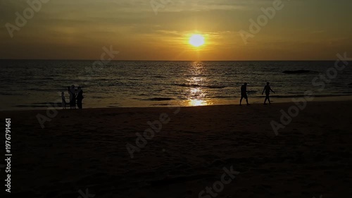 Golden Sunset Over Ocean Horizon Viewed From Beach During Calm and Peaceful Evening Time