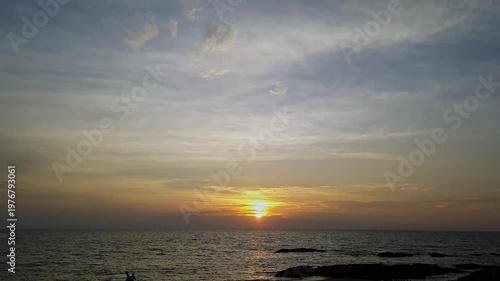 Beautiful Golden Sunset Over the Ocean Creating a Calm and Peaceful Evening Seascape