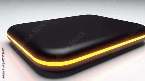 A sleek, black and orange external hard drive rests on a white surface, showcasing a modern design and minimalist aesthetic.