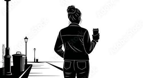 Silhouette of a woman in a denim jacket holding a coffee cup, walking down a street with lampposts and a trash can