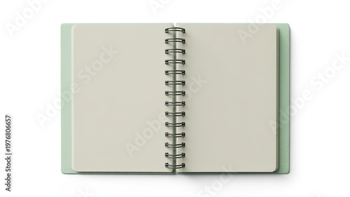 Open spiral bound notebook with pale green cover and cream pages on white background image