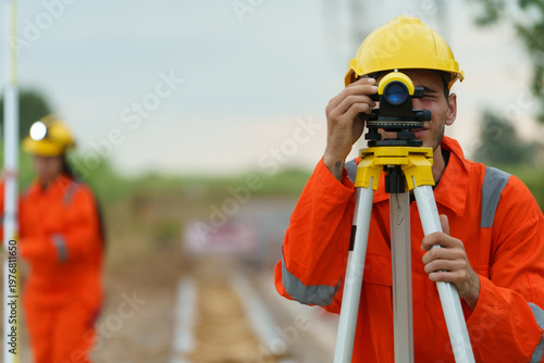 Schilderij op canvas Civil engineers are inspecting the completeness of the road construction at the wind farm