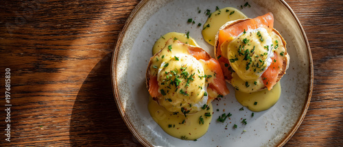 Luxury Eggs Benedict Breakfast Minimal Presentation on Wooden Table with Warm Natural Lighting