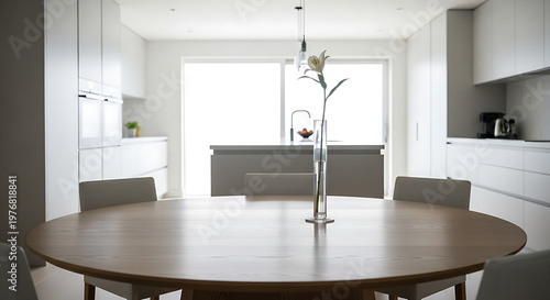 A large wooden table with chairs in a modern kitchen