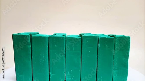 Green Dishwashing Soap Bars Moving in a Line, White Background Stock Footage