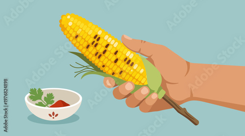 Hand Holding Grilled Corn on the Cob with Seasoning.