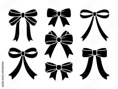 Collection of black ribbon bow silhouettes a white background