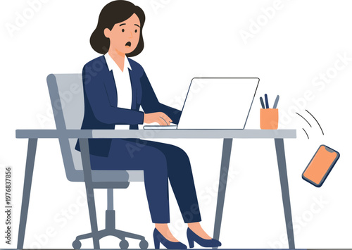 Businesswoman works on laptop at office desk with phone nearby