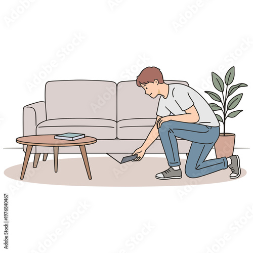 Man kneels on floor cleaning living room with vacuum cleaner