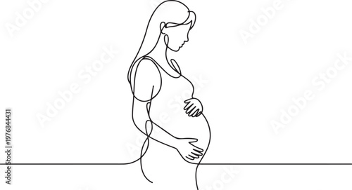 A pregnant woman standing with hands resting on her belly in a relaxed pose