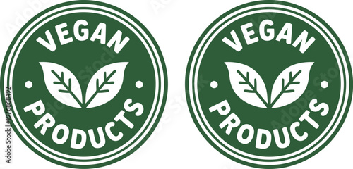 Two green vegan product labels with leaf logo on white