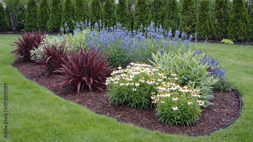 Ornamental garden bed with mixed flowering plants